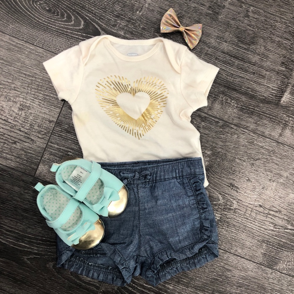 cream Onsie with Gold design and denim shorts